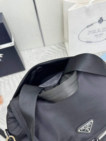 PRADA 25S EXPLORE BACKPACK 39 IN BLACK RE-NYLON AND CALFSKIN